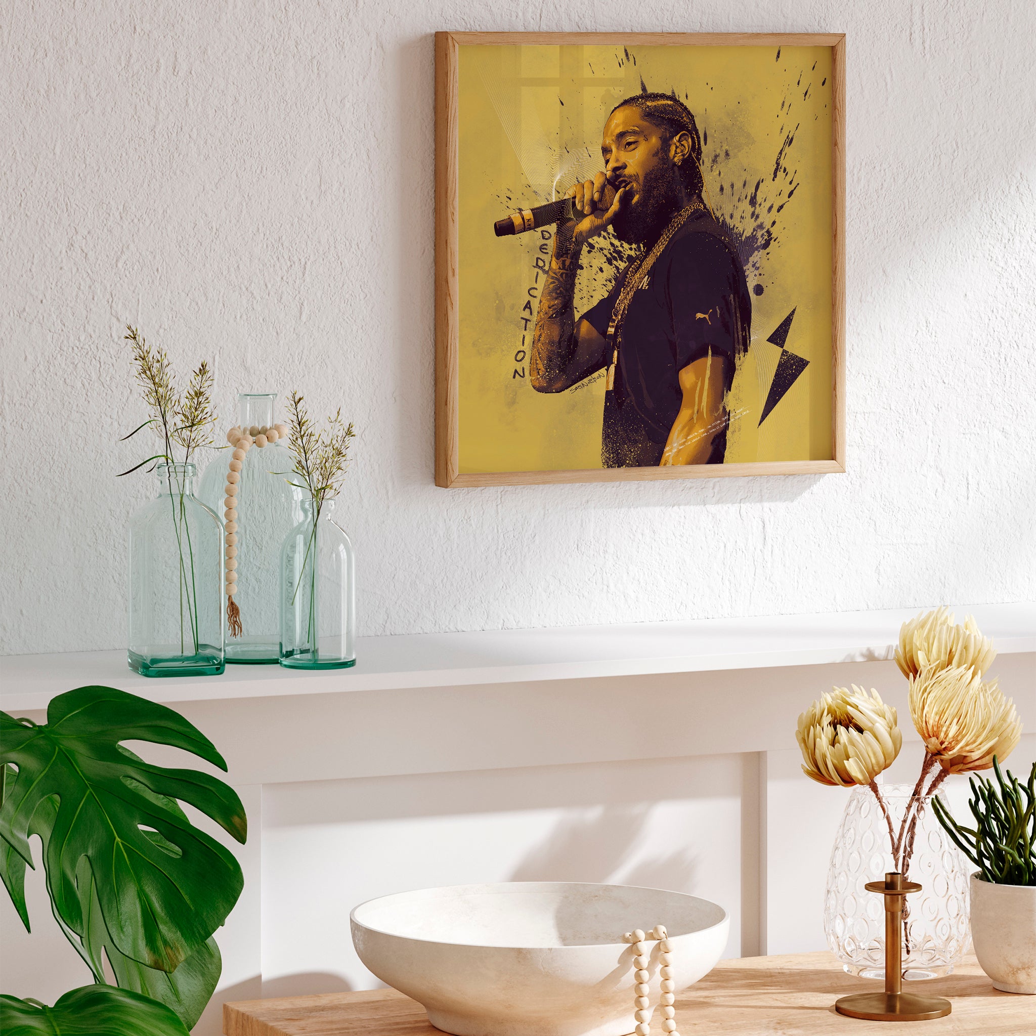 Nipsey Hussle art print in brown frame displayed in kitchen — hip hop wall art for home"