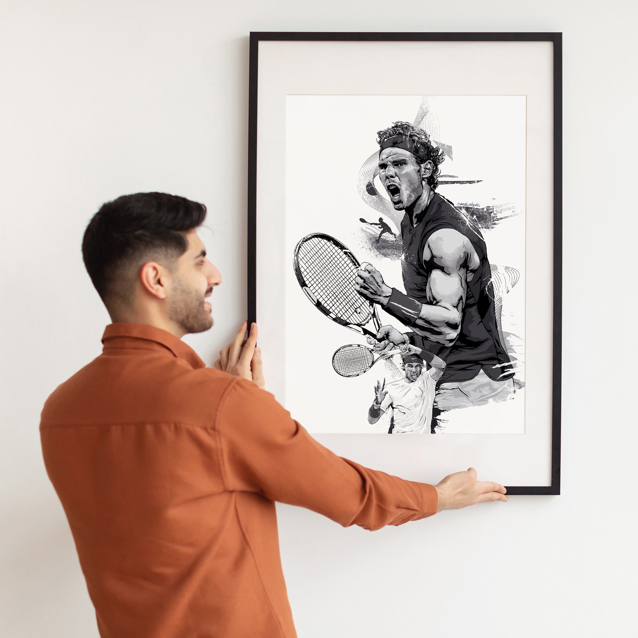 "Man holding Rafael Nadal illustrated poster — tennis gift for him"